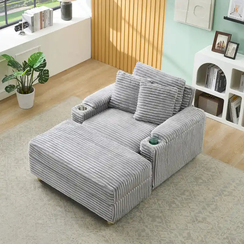 Canapé confortable en velours côtelé avec plusieurs coussins et options de rangement